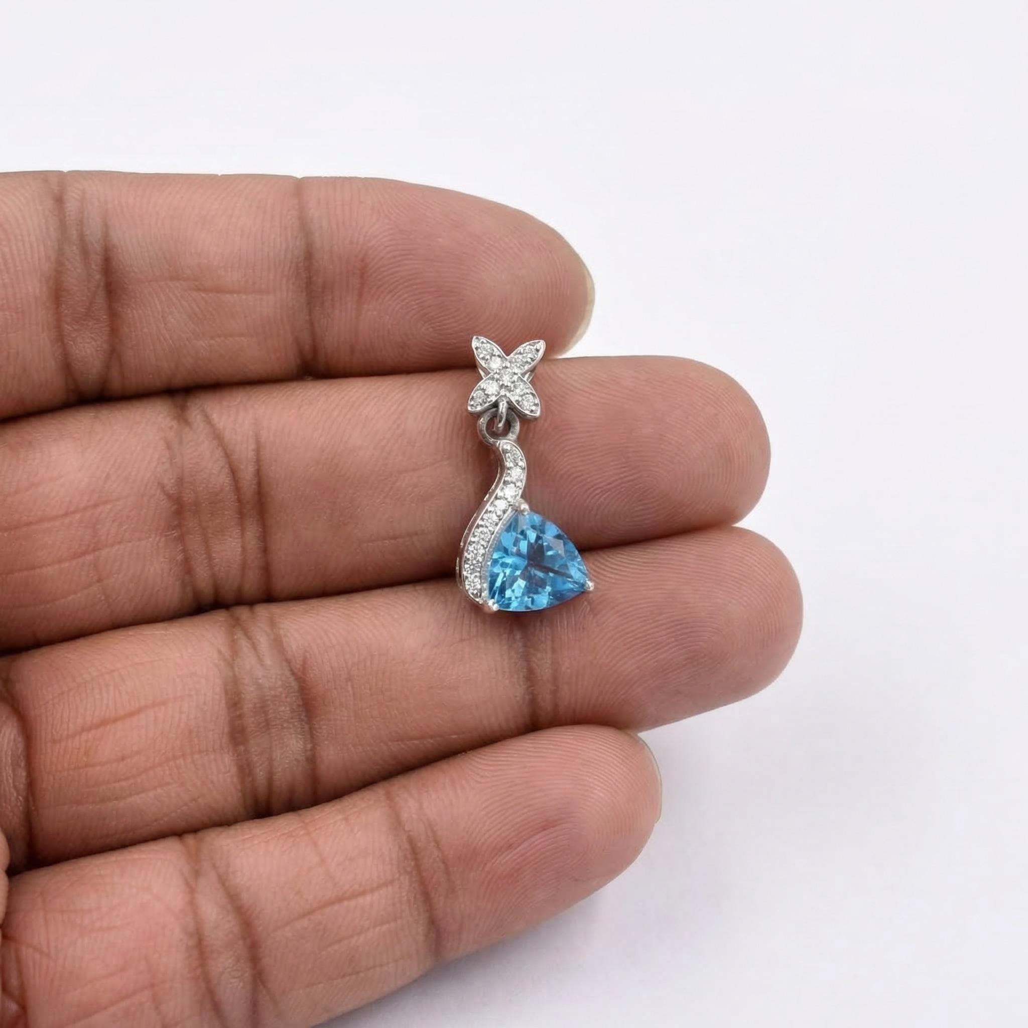 Sterling Silver Blue Topaz Wave Pendant – Diamond Star Accents, Minimalist Sky Blue Necklace