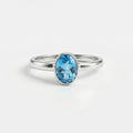 Blue Topaz Oval Ring: Sterling Silver December Birthstone