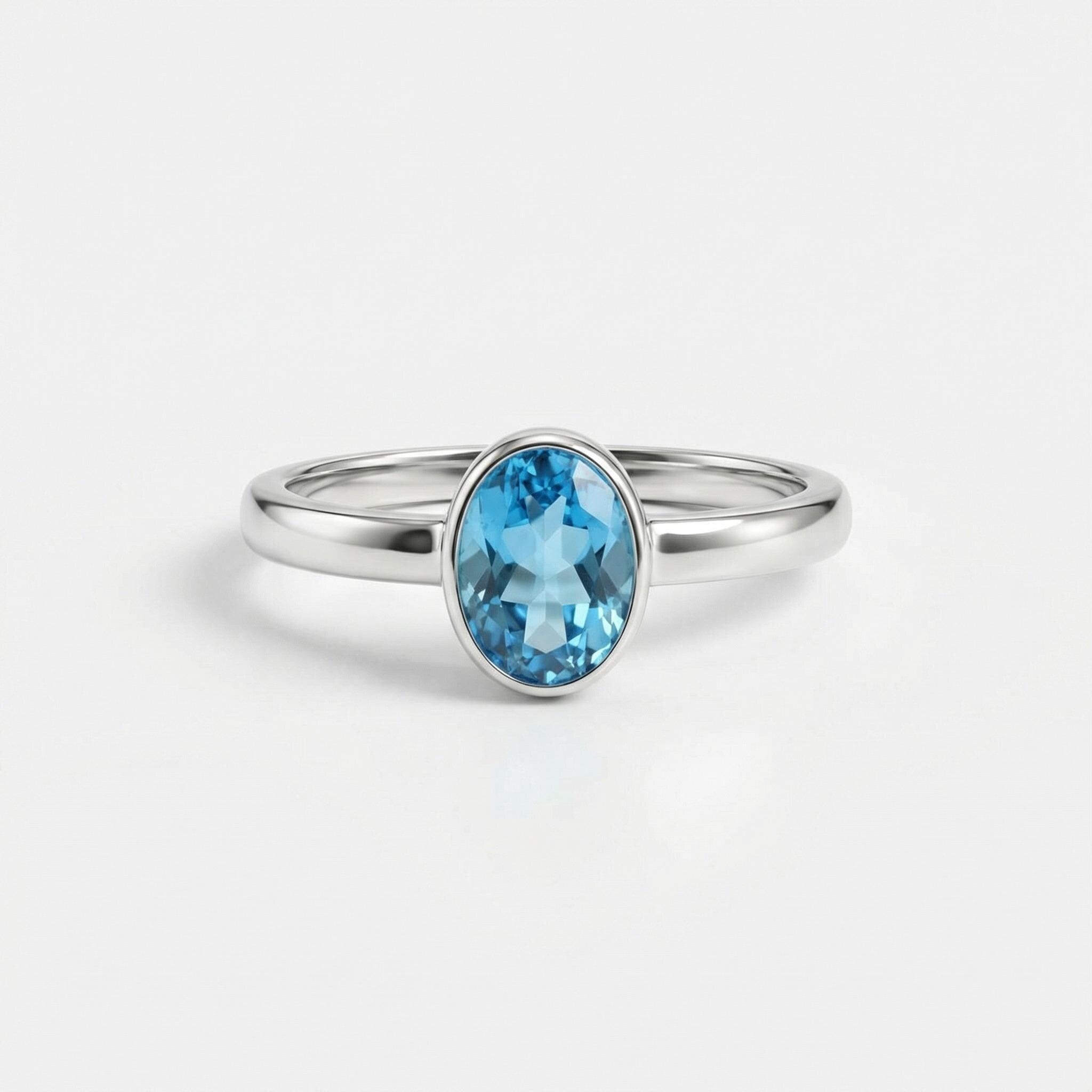 Blue Topaz Oval Ring: Sterling Silver December Birthstone