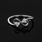 Sterling Silver Infinity Ring – Triangle CZ Accents, Geometric Promise Band