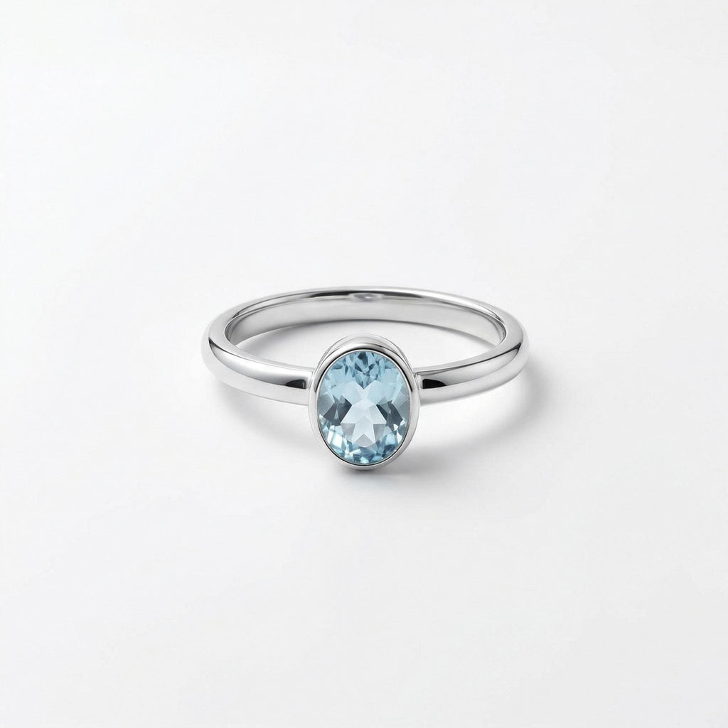 Blue Topaz Oval Ring: Sterling Silver December Birthstone