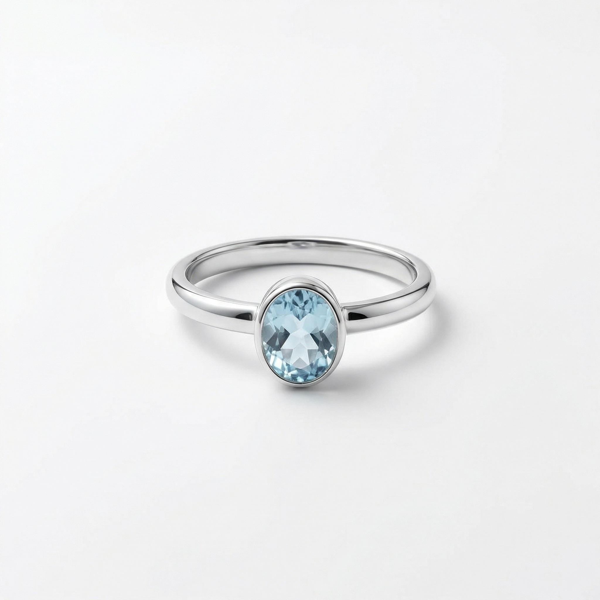 Blue Topaz Oval Ring: Sterling Silver December Birthstone