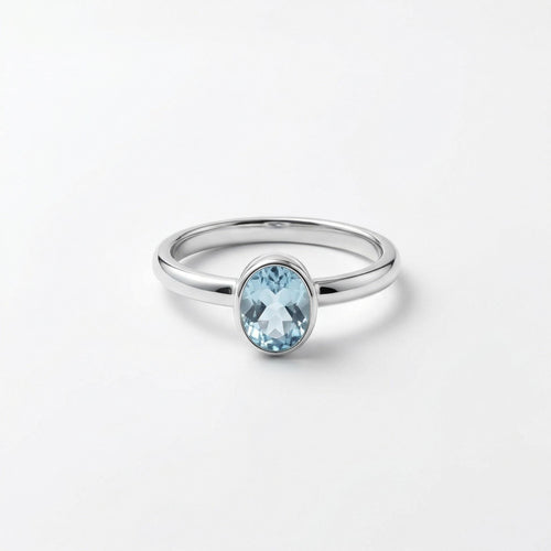 Blue Topaz Oval Ring: Sterling Silver December Birthstone