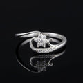 Sterling Silver Floral Swirl Ring with CZ Accents – Boho Promise Band